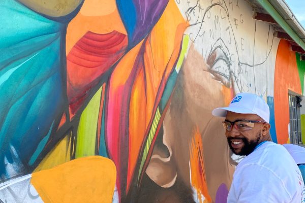 Community mural at Mamelodi High School by Strange Harvest — large‑scale graffiti style exterior wall painting in Tshwane, South Africa.1